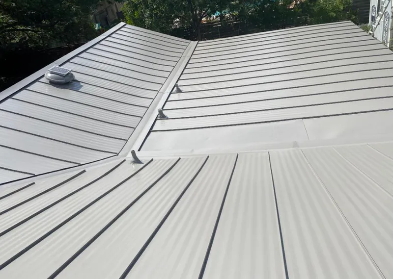 Solar attic fan installed on a metal roof for Roof Ventilation in Pollock Pines